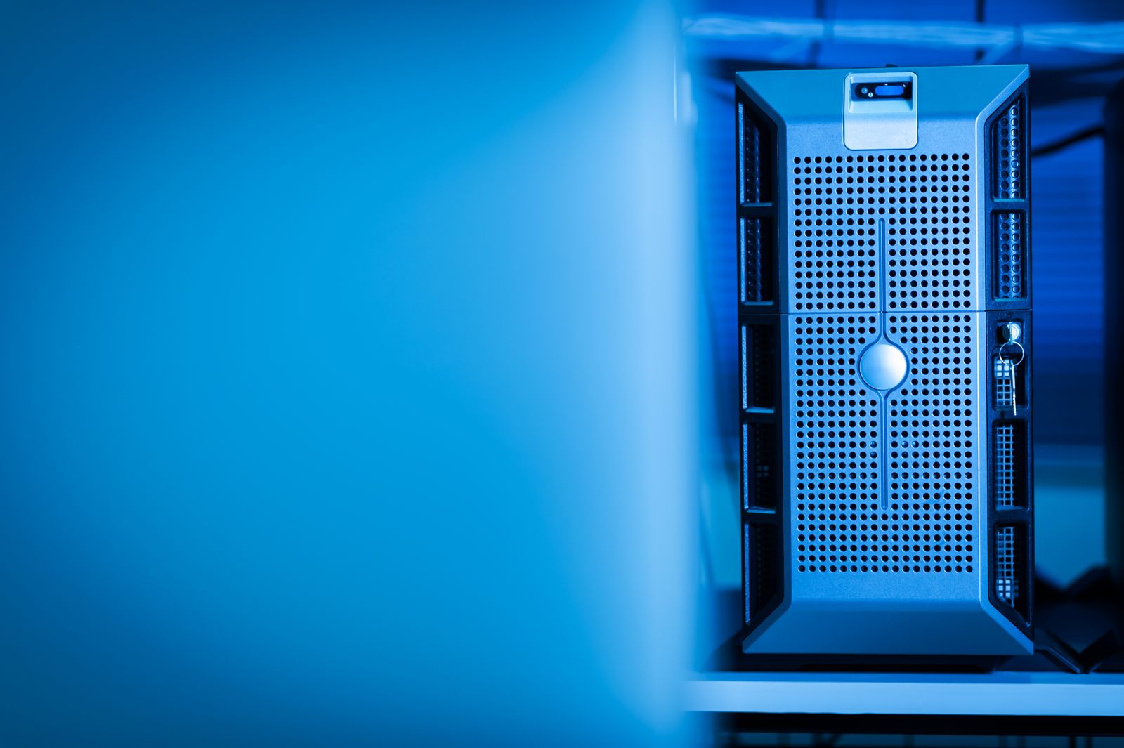 Rows of illuminated server racks in a data centre