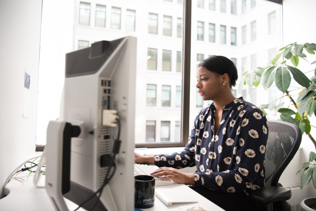 An engineer working at a desktop workstation